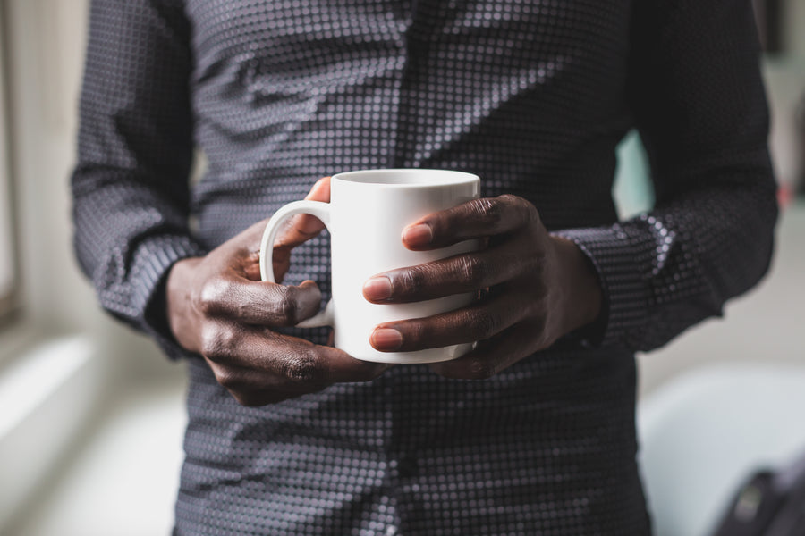 Man holding a cup of coffee